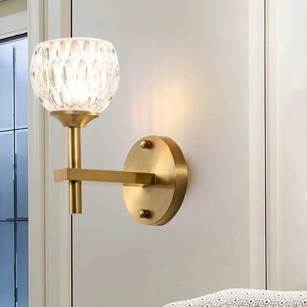 Modern black & gold wall light with dimpled glass for living room