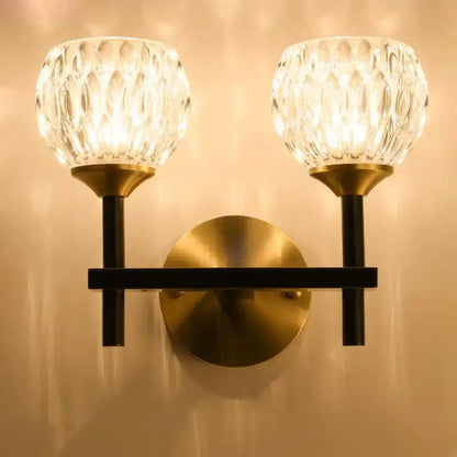 Modern black & gold wall light with dimpled glass for living room