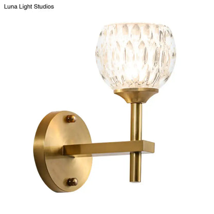 Modern black & gold wall light with dimpled glass for living room
