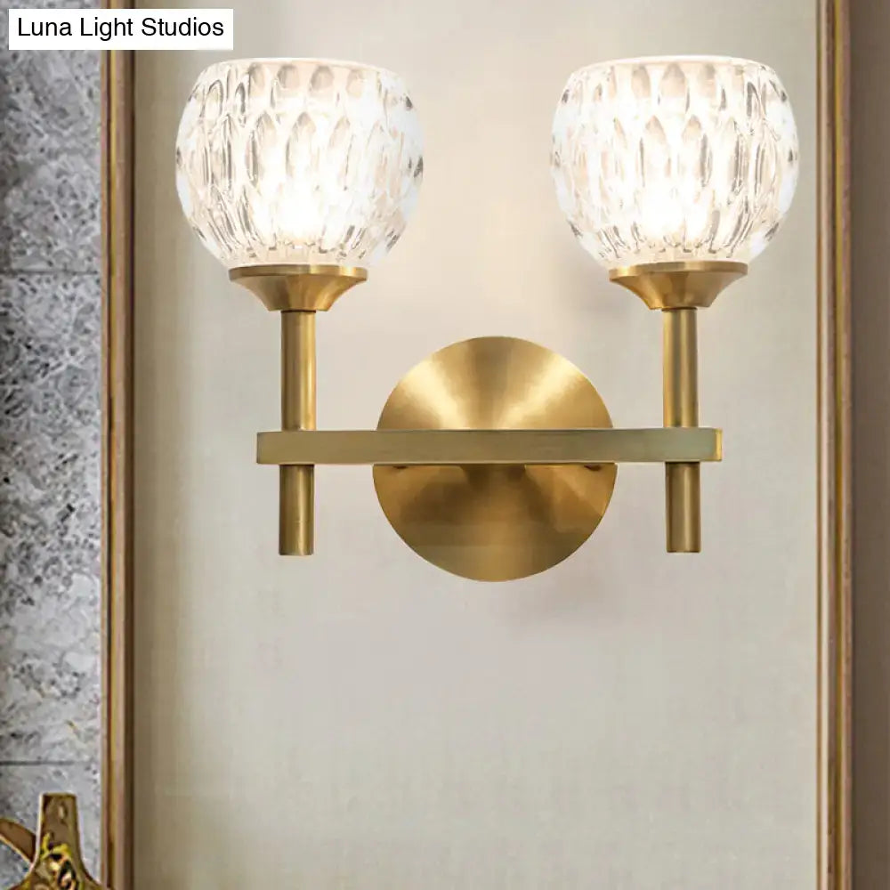 Modern black & gold wall light with dimpled glass for living room