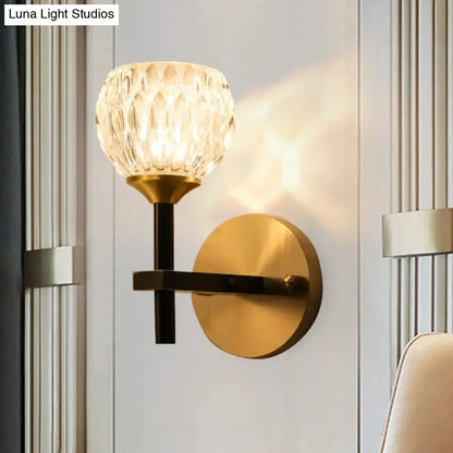 Modern black & gold wall light with dimpled glass for living room