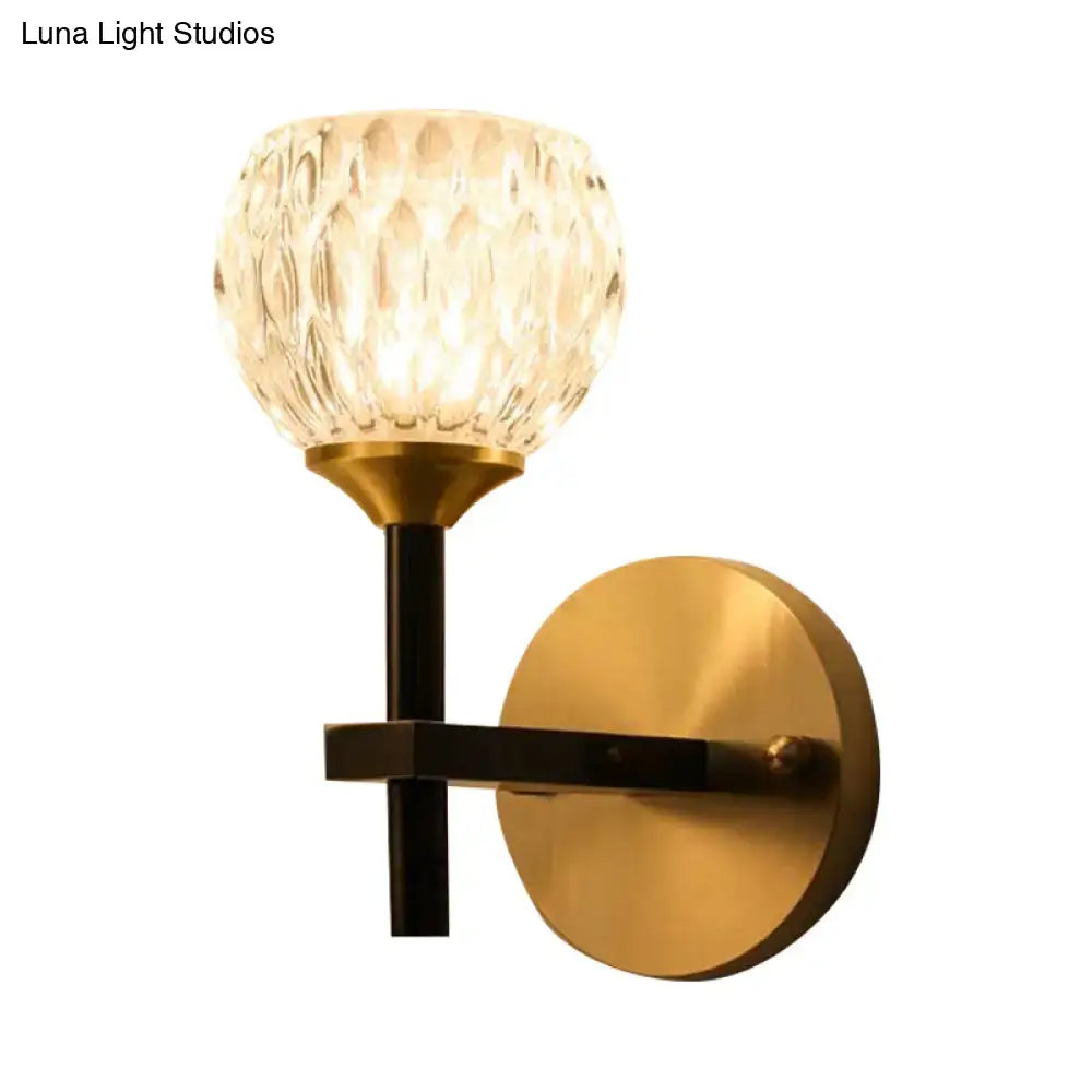 Modern black & gold wall light with dimpled glass for living room
