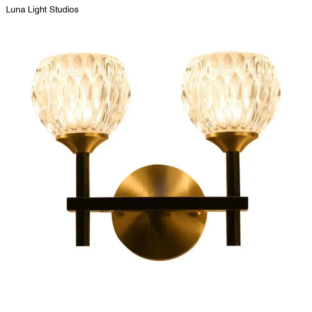 Modern black & gold wall light with dimpled glass for living room