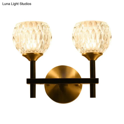 Modern black & gold wall light with dimpled glass for living room