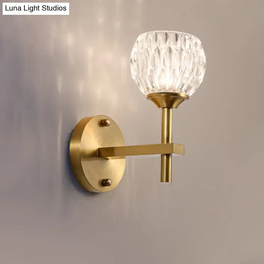 Modern black & gold wall light with dimpled glass for living room