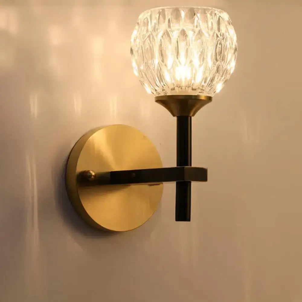 Modern black & gold wall light with dimpled glass for living room