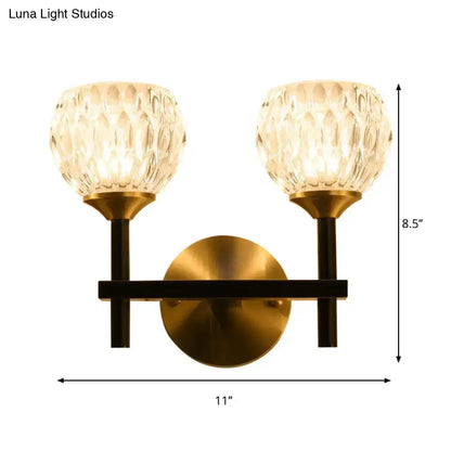 Modern black & gold wall light with dimpled glass for living room