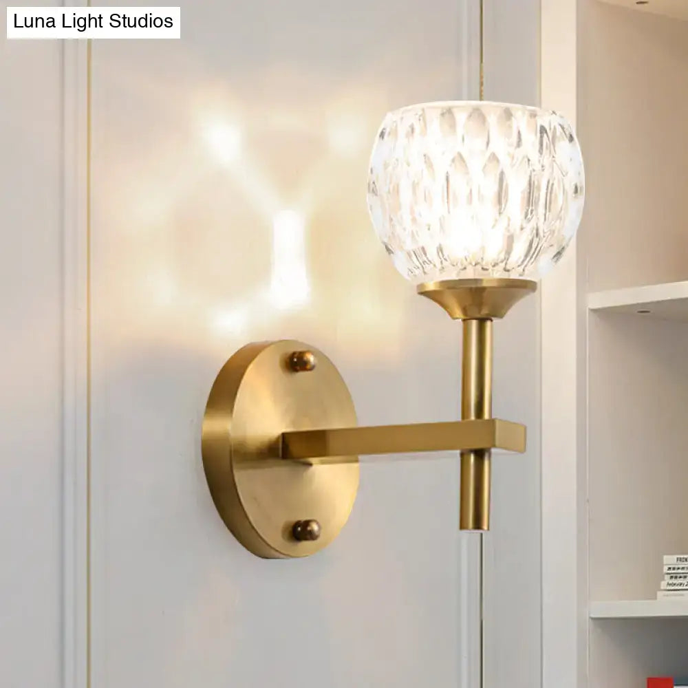 Modern black & gold wall light with dimpled glass for living room
