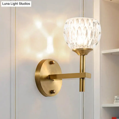 Modern black & gold wall light with dimpled glass for living room