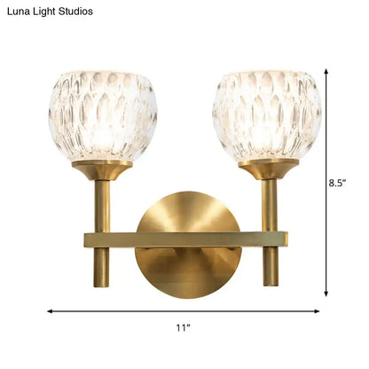 Modern black & gold wall light with dimpled glass for living room