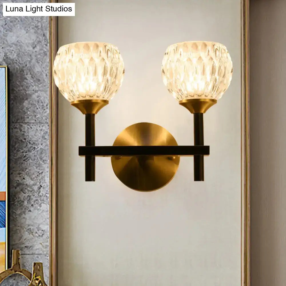 Modern black & gold wall light with dimpled glass for living room