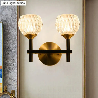 Modern black & gold wall light with dimpled glass for living room