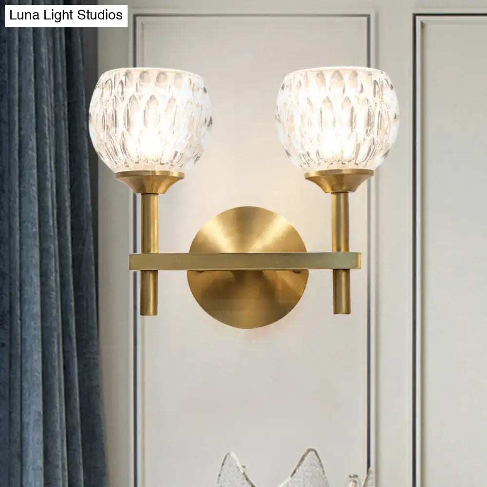 Modern black & gold wall light with dimpled glass for living room