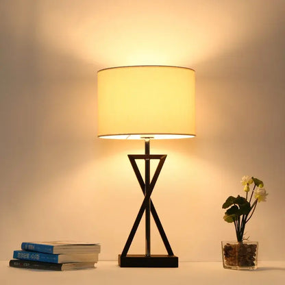 Modern black iron table lamp with fabric shade for bedroom