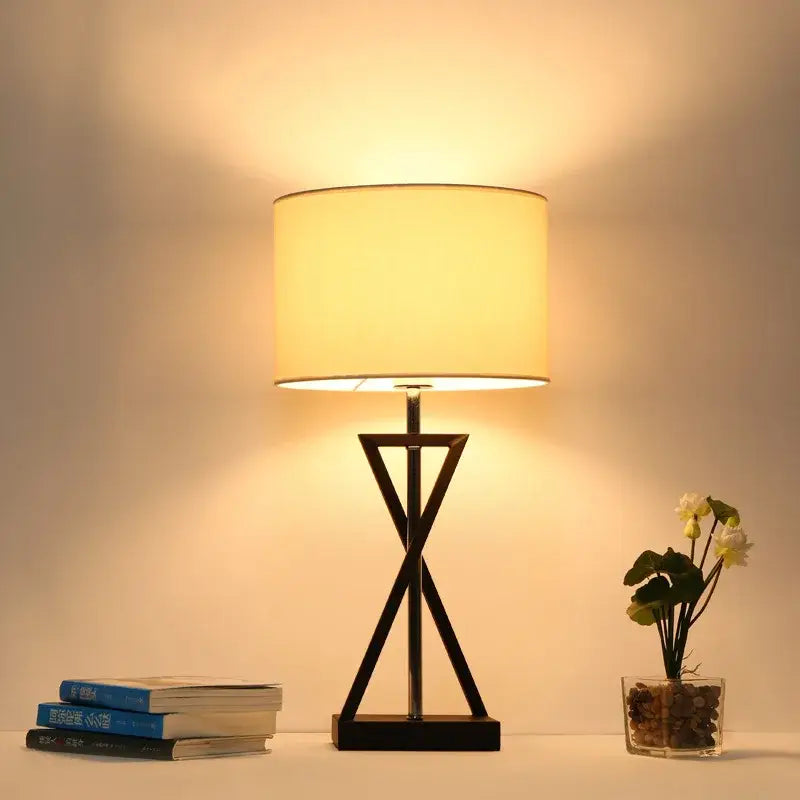 Modern black iron table lamp with fabric shade for bedroom