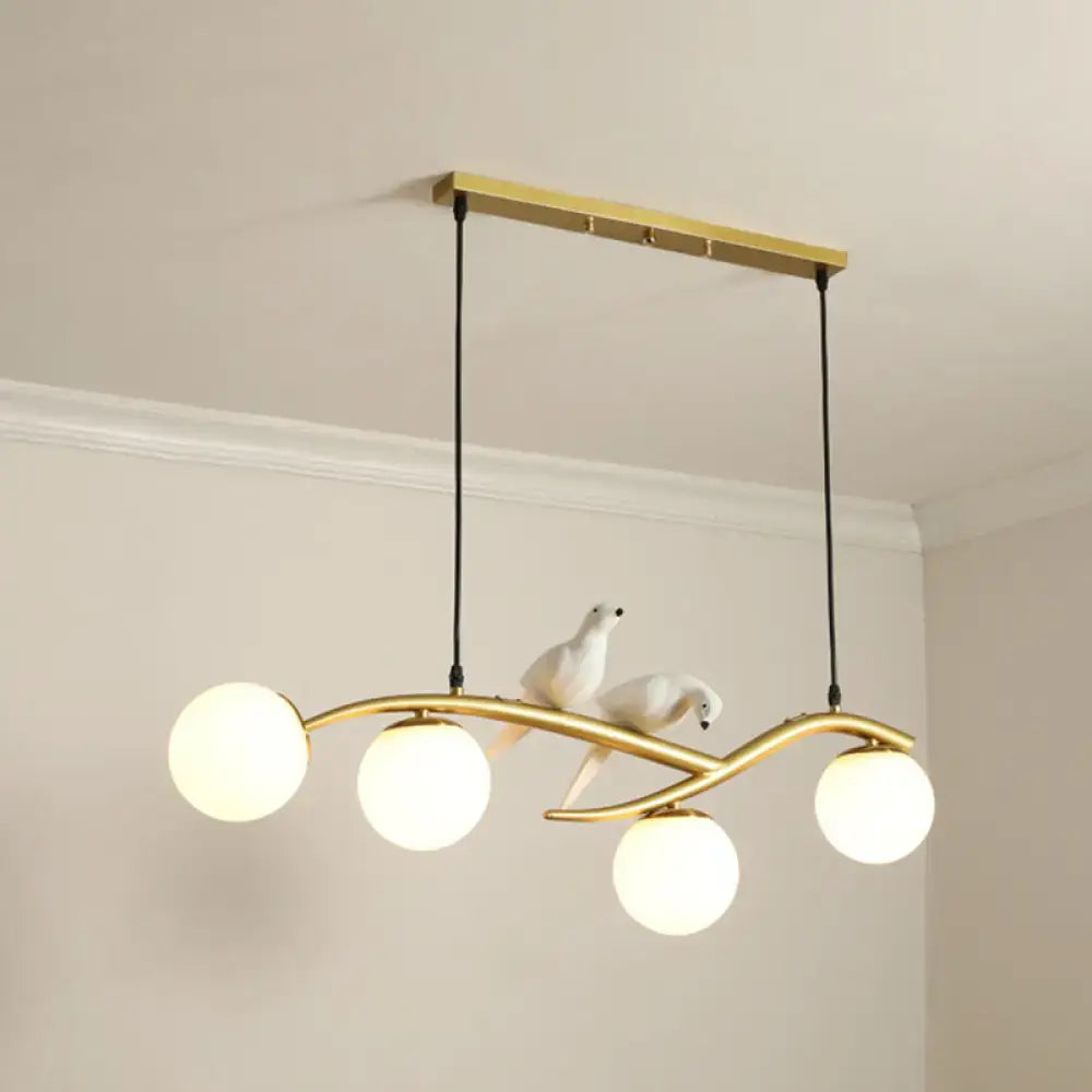 Modern black island pendant light with birds for dining room