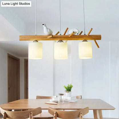Modern black island pendant light with birds for dining room