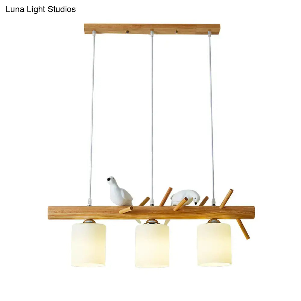 Modern black island pendant light with birds for dining room