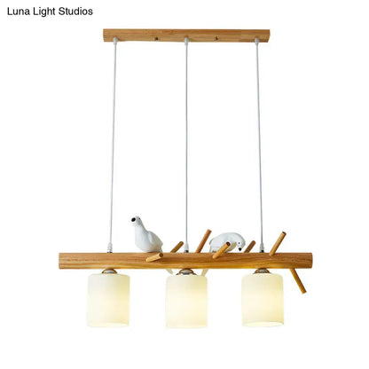 Modern black island pendant light with birds for dining room