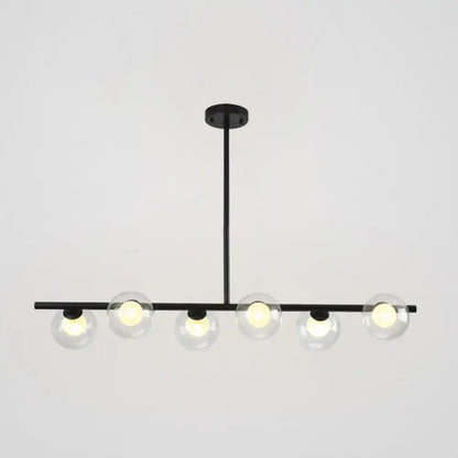 Modern black island pendant with clear glass globes dining room