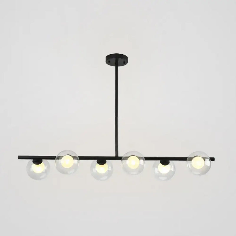 Modern black island pendant with clear glass globes dining room