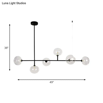 Modern black metal chandelier with glass globes – dining room light