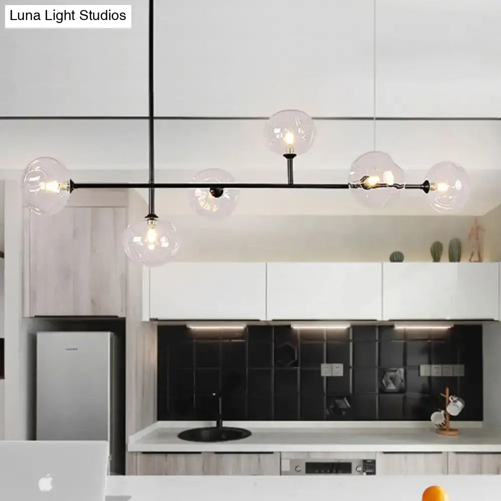 Modern black metal chandelier with glass globes – dining room light