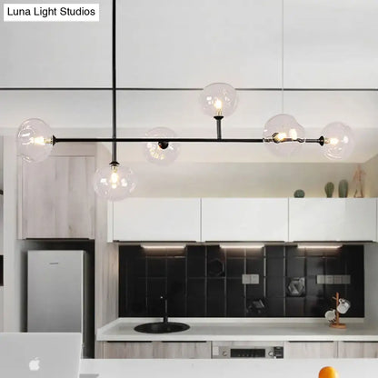 Modern black metal chandelier with glass globes – dining room light