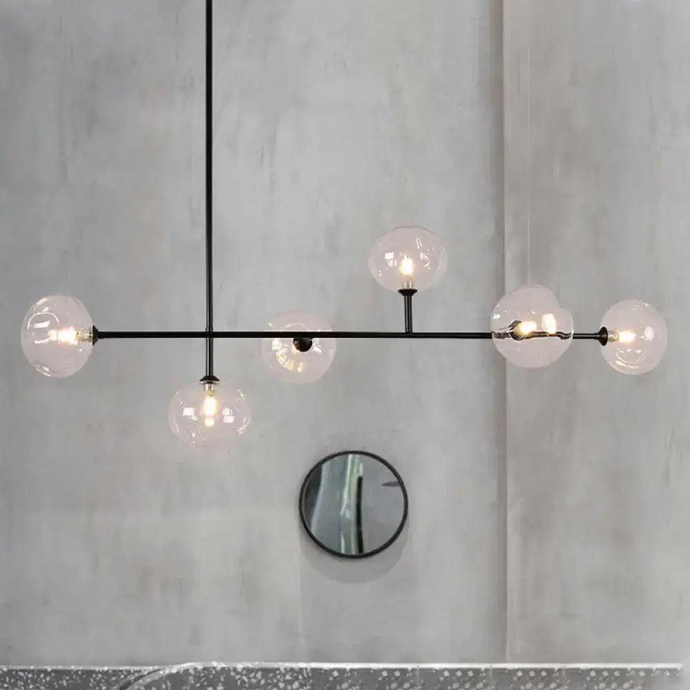Modern black metal chandelier with glass globes – dining room light