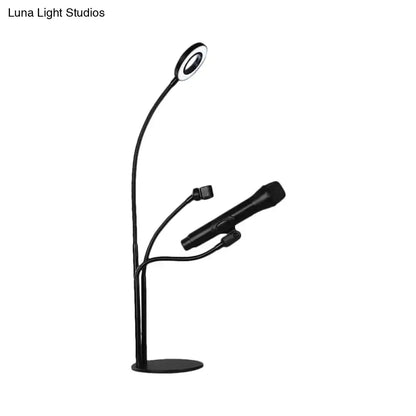 Modern black metal circular vanity light with desk phone holder bedroom