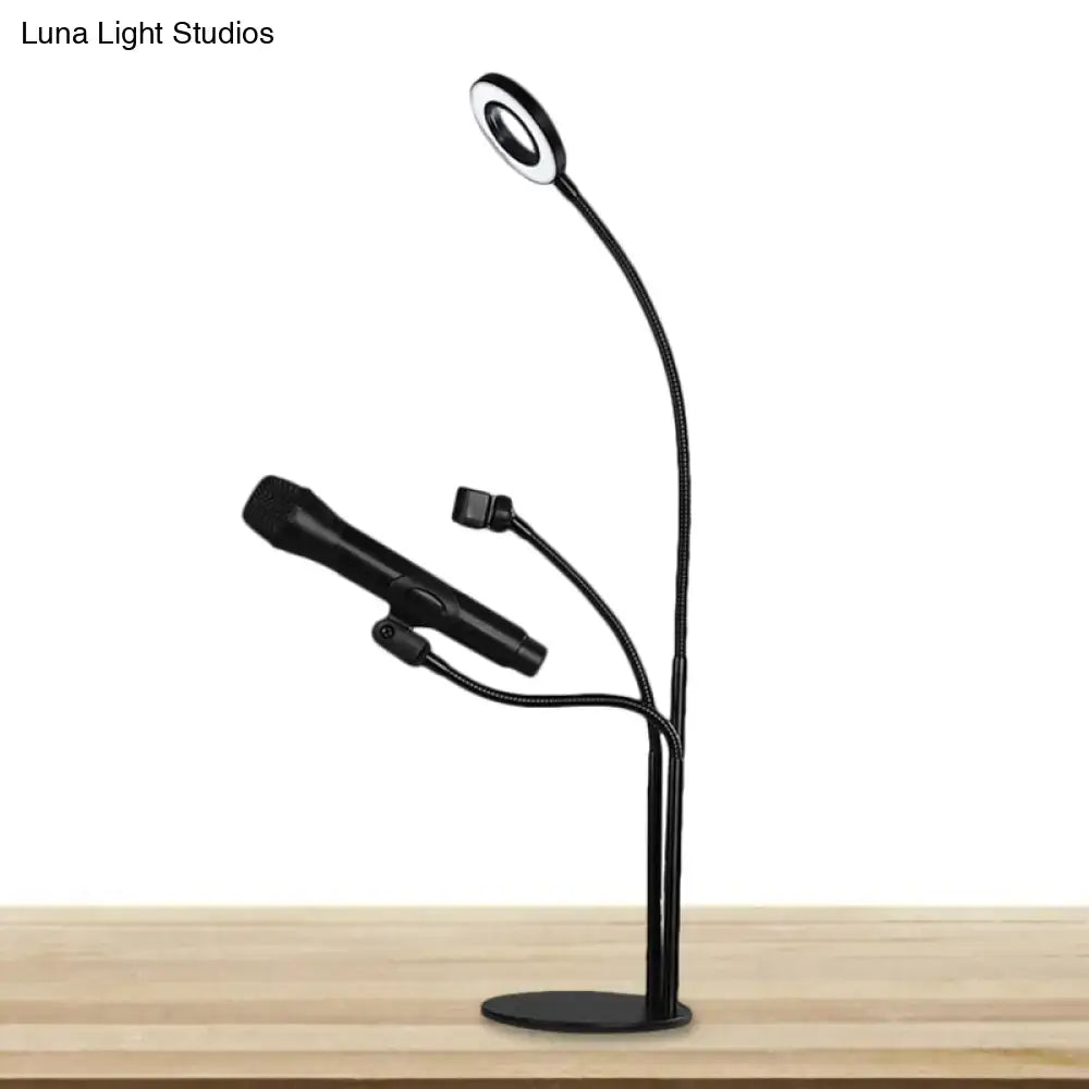 Modern black metal circular vanity light with desk phone holder bedroom