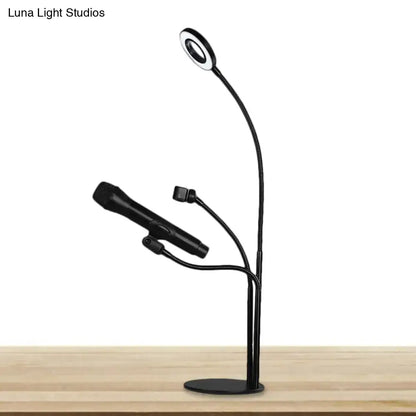 Modern black metal circular vanity light with desk phone holder bedroom