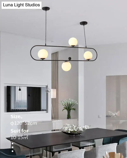 Modern black minimalist ellipse ceiling light with white globes living room