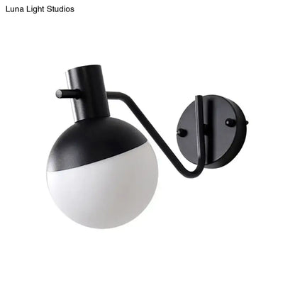 Modern black sconce light with milk glass shade living room