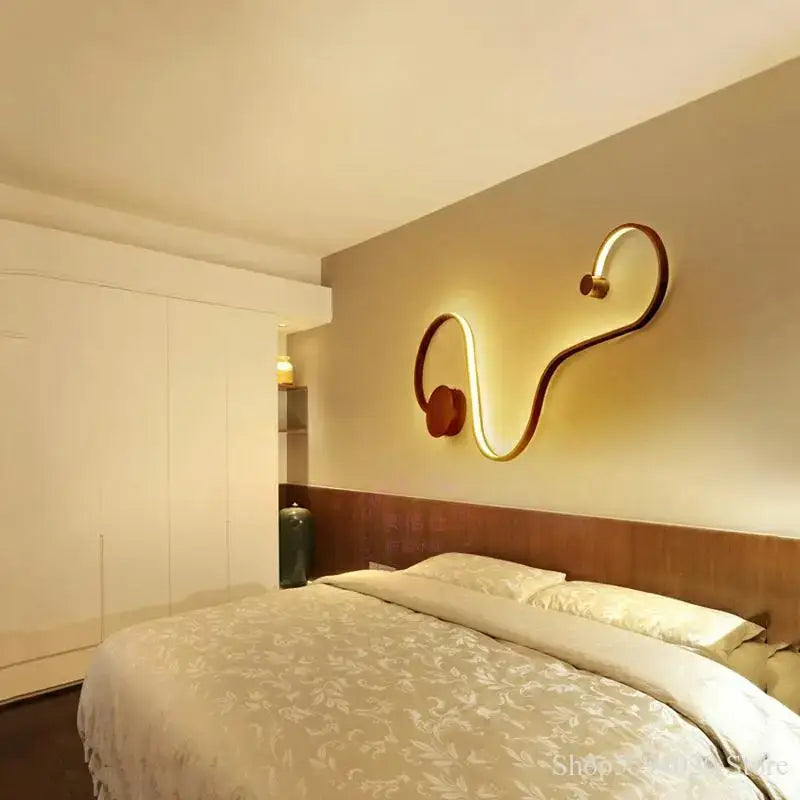 Modern black serpentine led wall sconce for living room decor
