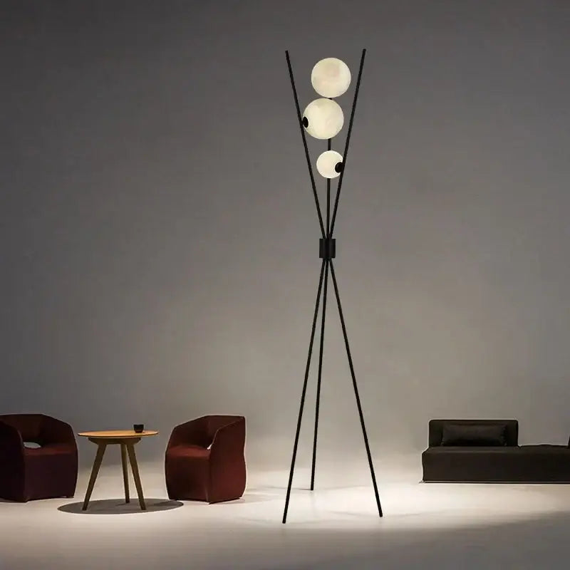 Modern black tripod moon floor lamp with white bulbs living room