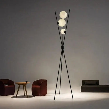 Modern black tripod moon floor lamp with white bulbs living room