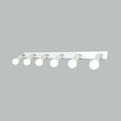 Modern black & white bedroom vanity light with exposed bulbs