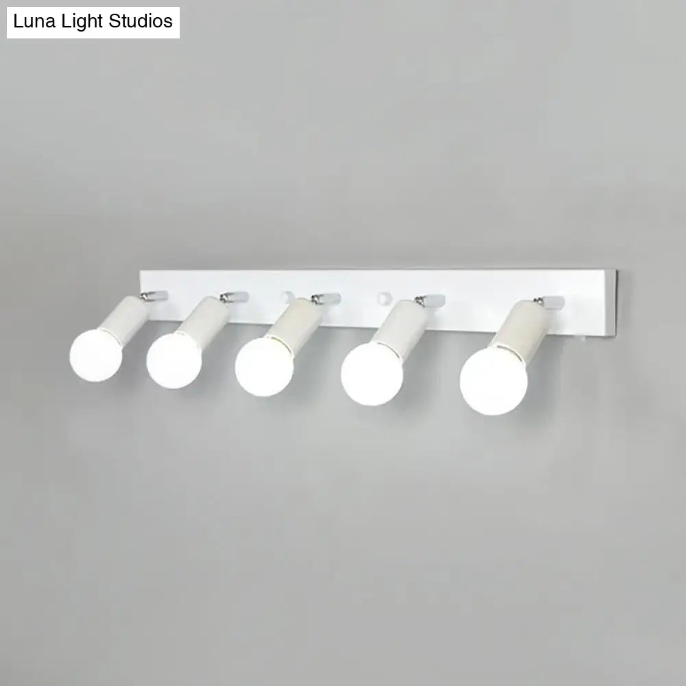 Modern black & white bedroom vanity light with exposed bulbs
