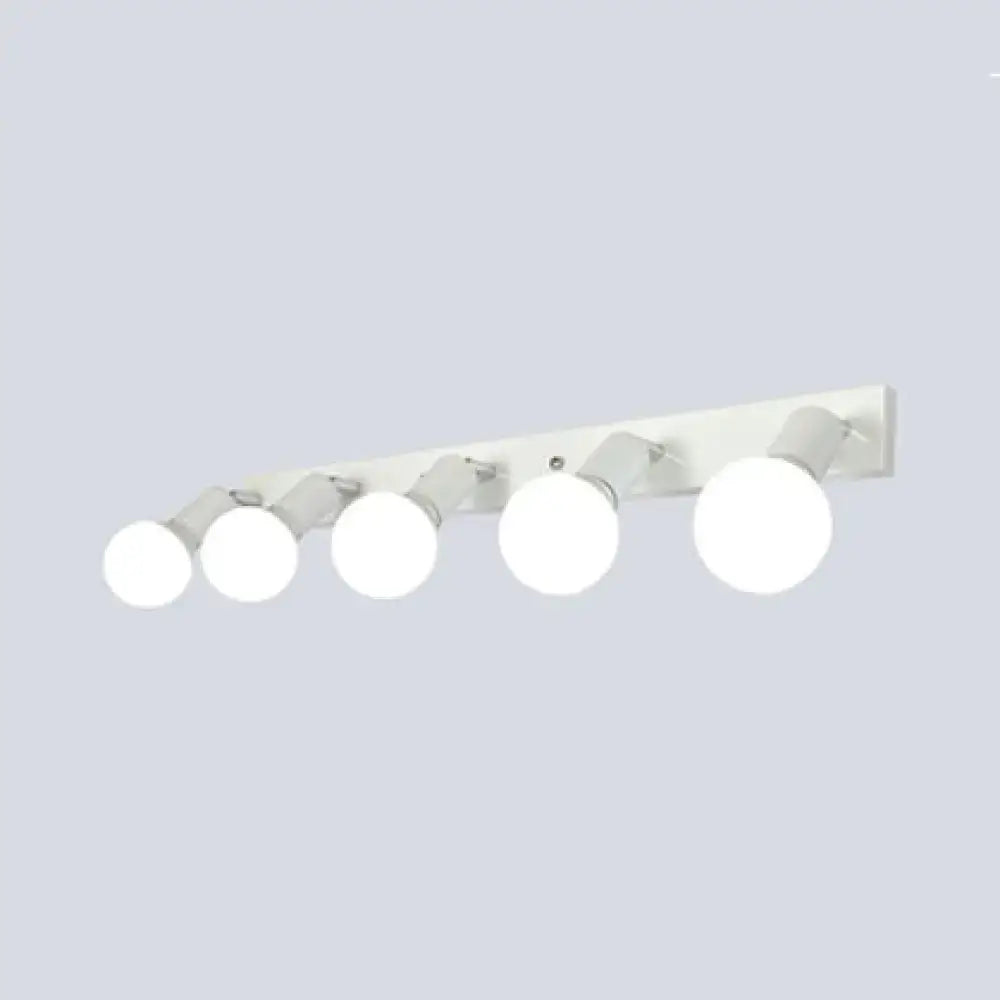 Modern black & white bedroom vanity light with exposed bulbs
