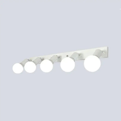Modern black & white bedroom vanity light with exposed bulbs