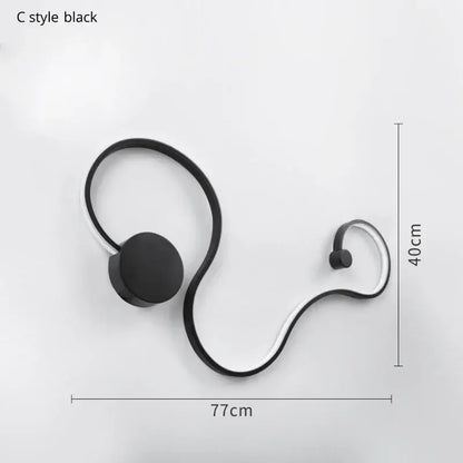 Modern black & white sculptural wall lamps for bedroom decor