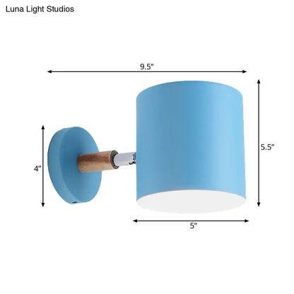 Modern blue metal tubular wall lamp with wood arm bedroom sconce light