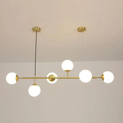 Modern brass 6-bulb island lamp with glass shade for dining rooms