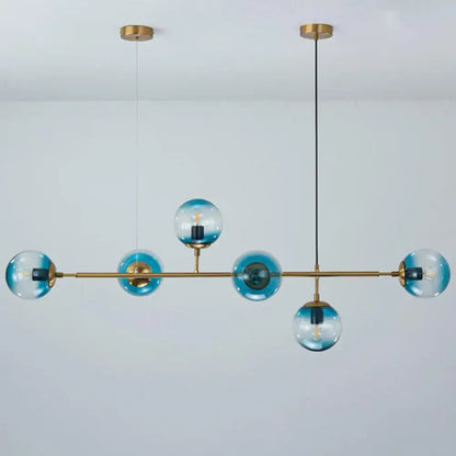 Modern brass 6-bulb island lamp with glass shade for dining rooms