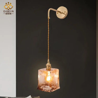 Modern brass and amber glass wall lamp for bedroom living room