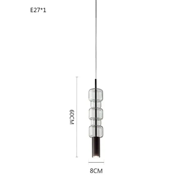 Modern brass and black cylindrical glass pendant light for kitchens