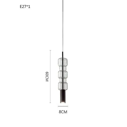 Modern brass and black cylindrical glass pendant light for kitchens