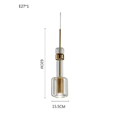 Modern brass and black cylindrical glass pendant light for kitchens