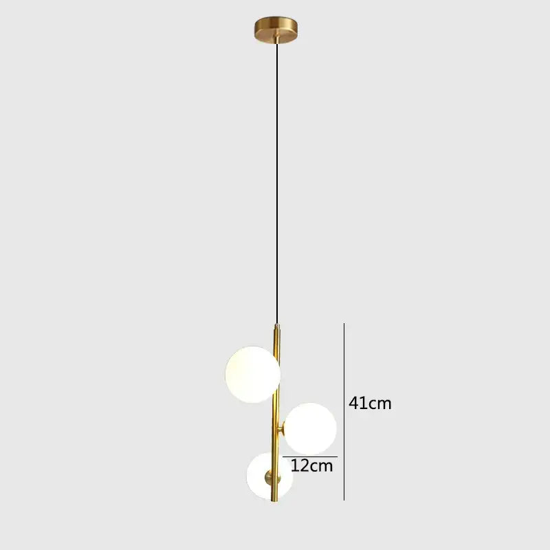 Modern brass and black glass ball pendant light dining room